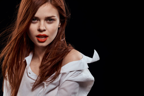 beautiful woman long hair red lips white shirt dark isolated background Studio - Fotografie, Obrázek