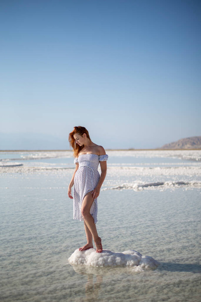 Young girl on Dead Sea, Israel. Ein Bokek - 写真・画像