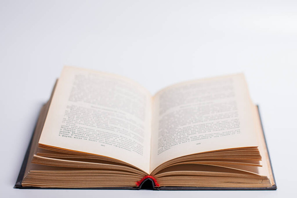 Photo of an open book on a white background. - Zdjęcie, obraz