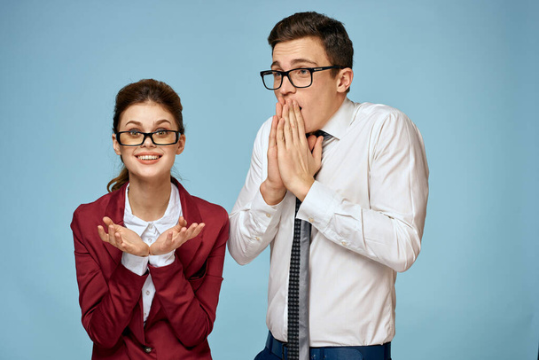 Business young couple officials office team office blue background - Foto, Imagem
