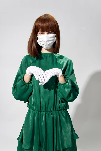  Fashion female coronavirus, model posing with gloves and protective medical mask - Fotoğraf, Görsel