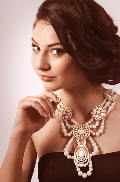 woman with makeup and with jewelry - Photo, Image