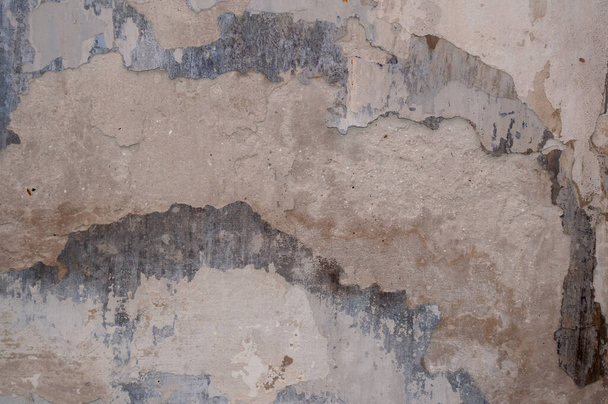 Fondo de pared gris viejo. pelando pintura. foto - Foto, imagen