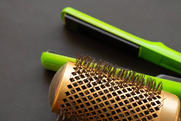 comb and hair curler on isolated background close up, hair care - Photo, Image