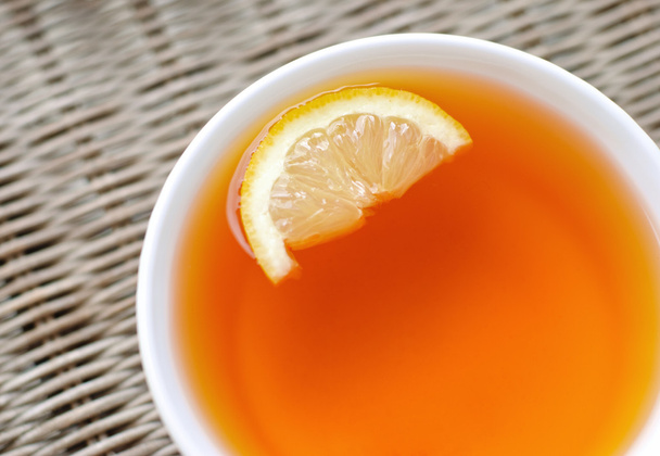 Tè con un limone
 - Foto, immagini