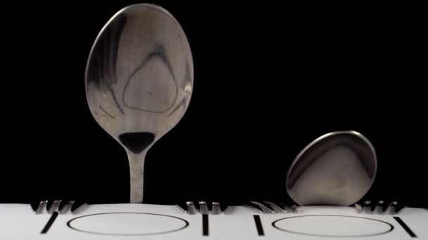 Abstract family made of spoon and forks getting ready to eat. - Footage, Video