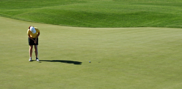 Femme sur le terrain de golf
 - Photo, image