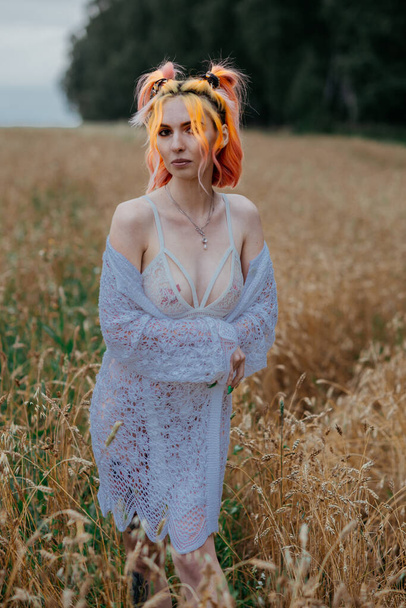 girl with colored hair in underwear in a wheat field - Fotografie, Obrázek