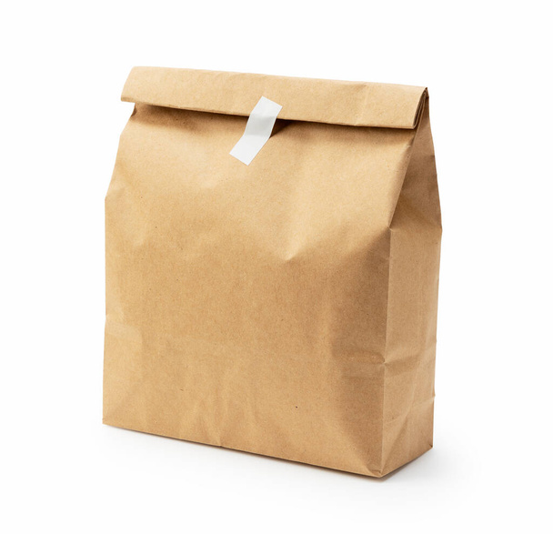 Un sac en papier brun sur fond blanc - Photo, image