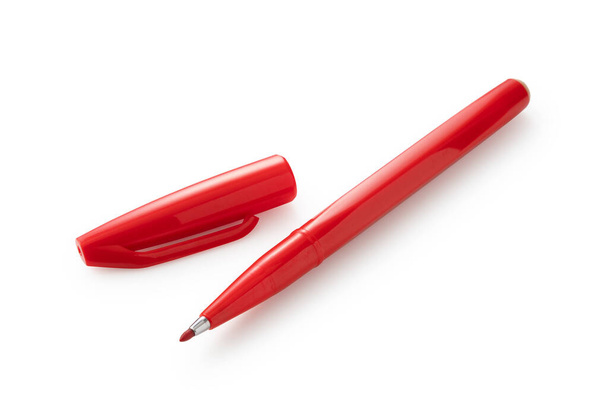 Roter Stift auf weißem Hintergrund - Foto, Bild