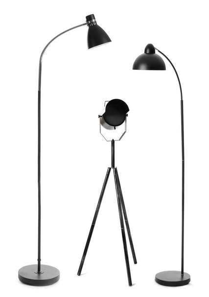 Set verschiedener schwarzer Stehlampen auf weißem Hintergrund - Foto, Bild