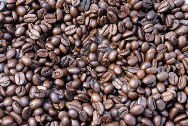 Nahaufnahme geröstete Kaffeebohnen Hintergrund und Textur - Foto, Bild