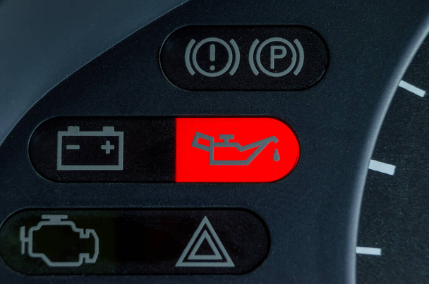 Screen symbols battery and Oil lamp warning light in-car dashboard - Photo, Image