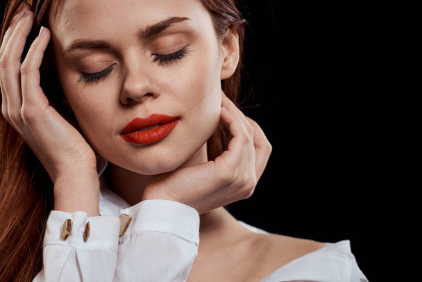 beautiful woman elegant style red lips unbuttoned white shirt close-up black background - Photo, Image