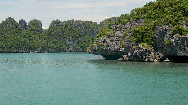 Group of Islands in ocean at Ang Thong National Marine Park near touristic Samui paradise tropical resort. Archipelago in the Gulf of Thailand. Idyllic turquoise sea natural background, copy space - Photo, Image
