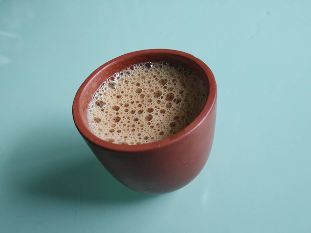 Szekrény kézzel készült Clay vagy Sand Coffee Cup elszigetelt fehér alapon - Fotó, kép