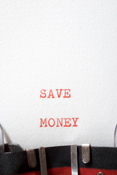 Save money phrase written with a typewriter. - Photo, Image