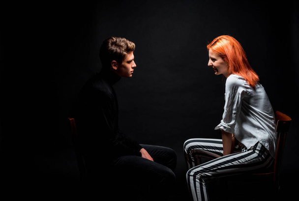 Studio fashion shot of modern guy and redhead girl posing in stylish trendy clothes - Photo, Image