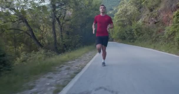 Endurance training, running man, dolly shot - Video