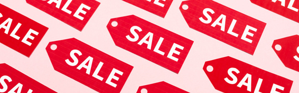 website header of labels with sale lettering on pink, black friday concept - Foto, Bild