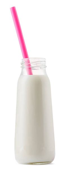 Glass cup of milk with a straw isolated on white - Foto, afbeelding