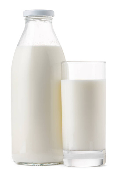Glass bottle and cup of fresh milk isolated - Fotó, kép