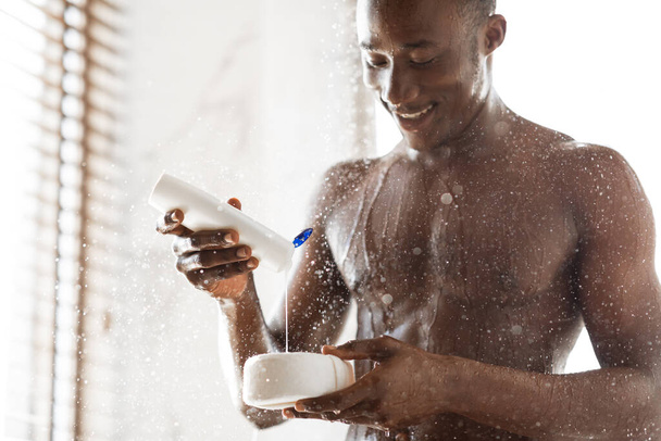 Man Pouring Shower Gel On Sponge Washing Body In Bathroom - Photo, Image