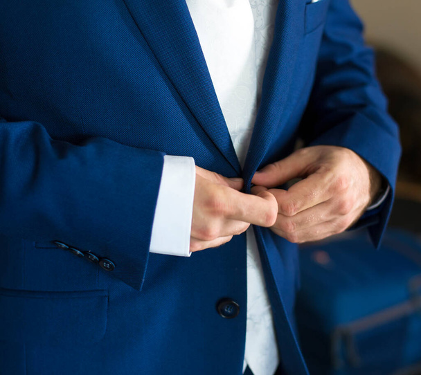Man dress oneself elegant suit - Foto, imagen