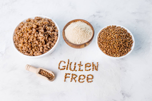 gluten-free products - buckwheat groats, buckwheat flour, buckwheat pasta - Photo, Image
