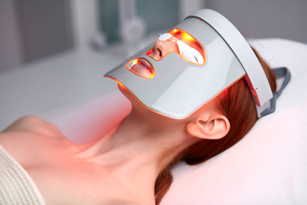 female patient get trendy skin rejuvenation treatment to face - Фото, изображение
