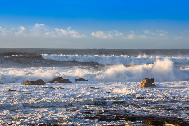Waves breaking on rocky coast - Photo, Image