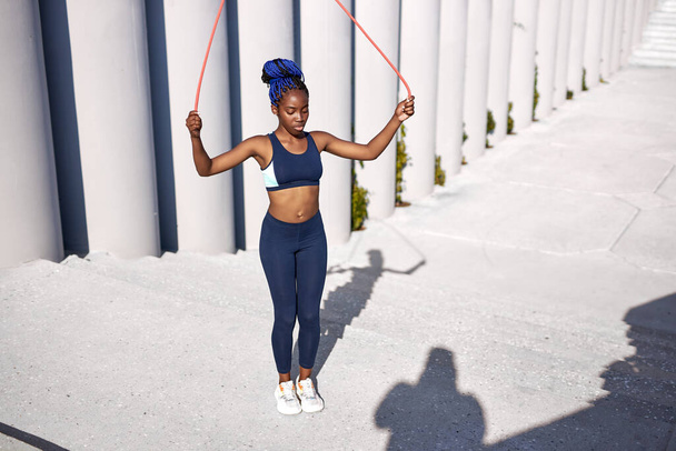 black african woman jump rope - Foto, Imagen