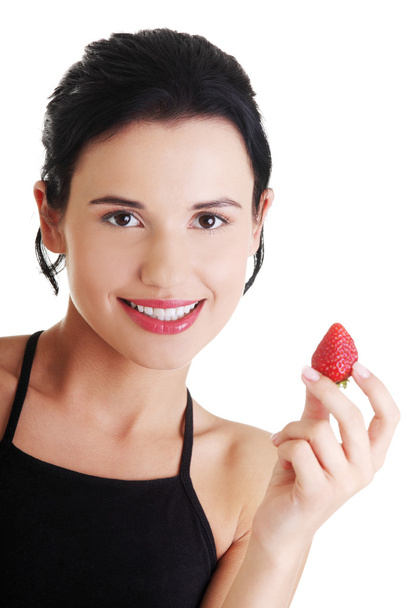 Жінка їсти полуницю
 - Фото, зображення