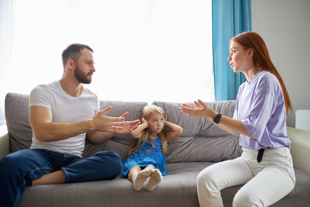 divorced caucasian parents arguing about child custody - Fotoğraf, Görsel