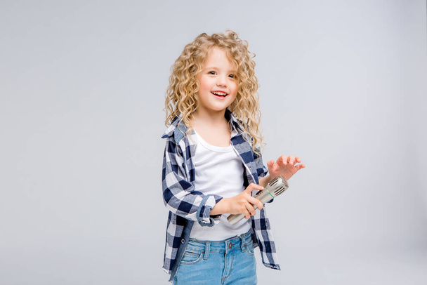 cute young girl with microphone in studio - Photo, Image