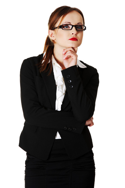 Young businesswoman is thinking.  - Фото, зображення
