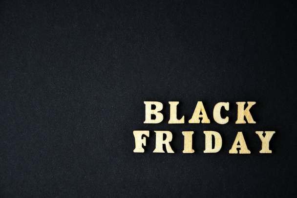 Wooden letters text BLACK FRIDAY in front black background, copy space, banner Top view Flat lay seasonal sale, retail, shopping concept. Black friday sale - Fotografie, Obrázek