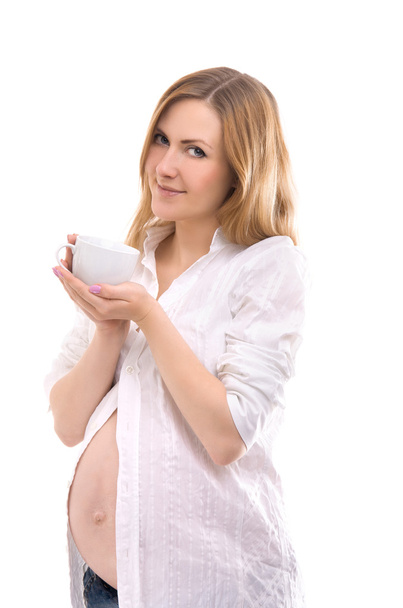 pregnant woman with tea cup - Zdjęcie, obraz