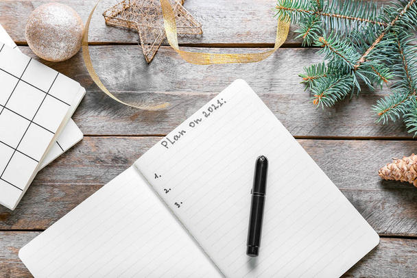 Empty to do list with Christmas decor on wooden background - Photo, Image
