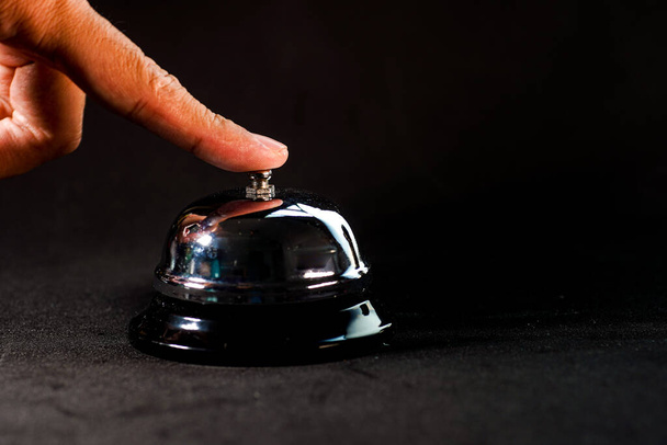 Reception Bell isolated against black background - Photo, Image
