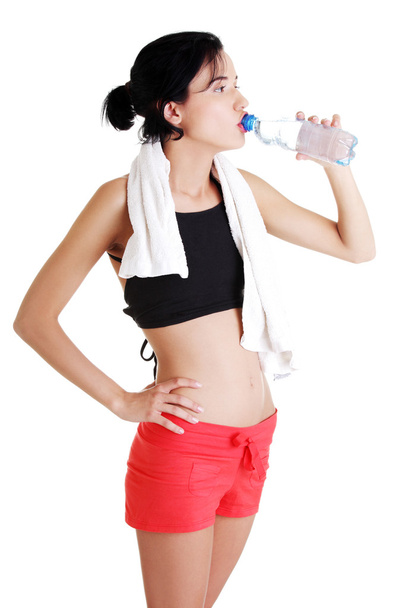 Woman drinking mineral water - Foto, Imagem