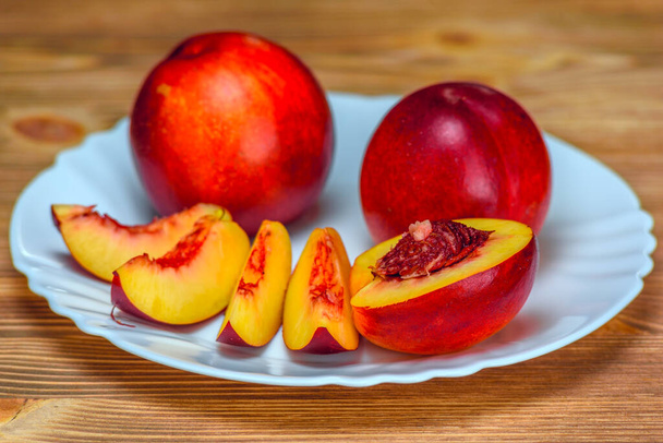 nectarines on a plate - Foto, immagini