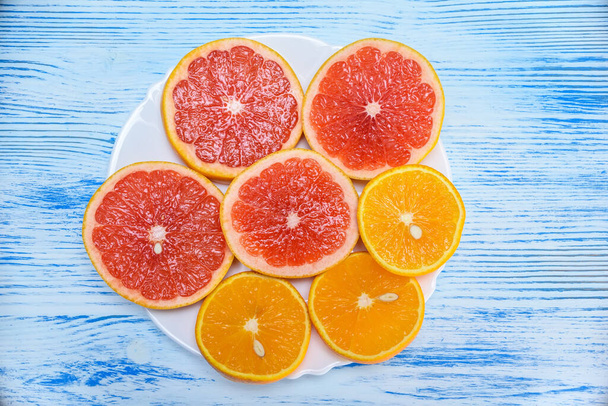 View on slices of fresh citrus fruits - Fotografie, Obrázek