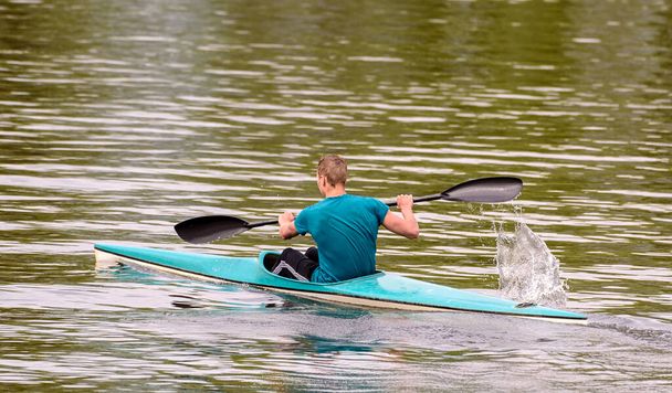 a man sails on a kayak - Фото, изображение