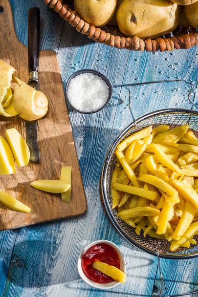 During the preparation of homemade fries - Fotoğraf, Görsel