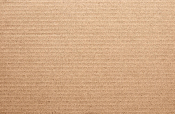 Brown cardboard sheet abstract background, texture of recycle paper box in old vintage pattern for design art work. - Photo, Image