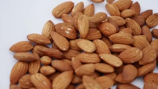 Nut almond close up. product rich in minerals and vitamins. Almond turns in a shot - Footage, Video