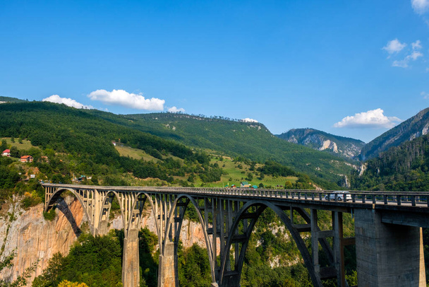 Durdevica Tara arc bridge in the mountains, Montenegro - Φωτογραφία, εικόνα