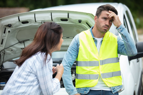 woman berating man after car breaks down - Photo, image