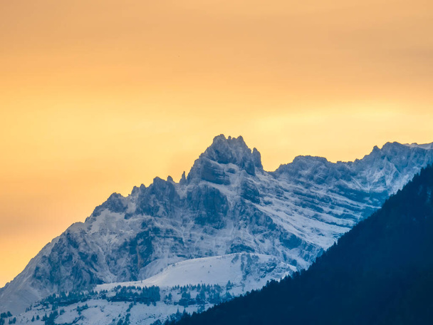 Sunset view of the Alpstein massif overlooking the region between Lake Zurich and Lake Walenstadt in the canton of St. Gallen, Switzerland - Φωτογραφία, εικόνα